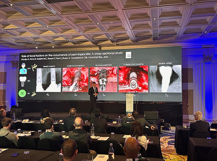 El Dr. Alberto Monje dio una charla sobre cómo prevenir y manejar complicaciones en la terapia con implantes en un simposio internacional en Australia.